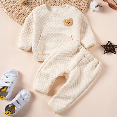 "Cozy Bear-themed baby outfits for autumn-winter."